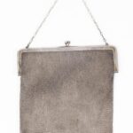 Sterling silver mesh purse with garnet hangings