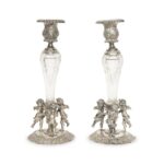 A Pair of German Silver and Cut Glass Figural Candlesticks