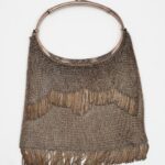 An Art Deco Continental 800 silver evening bag with tassel fringe