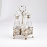 A VICTORIAN SILVER FIVE-BOTTLE CRUET STAND